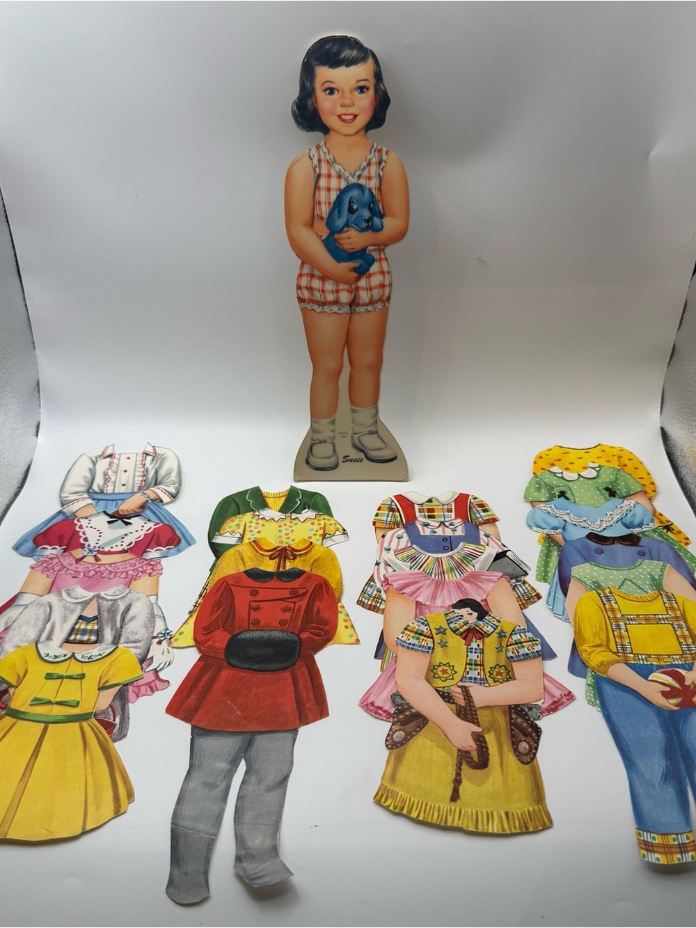 Vintage 1940s Saalfield
Susie Paper Doll Set with Cut Out Clothes
